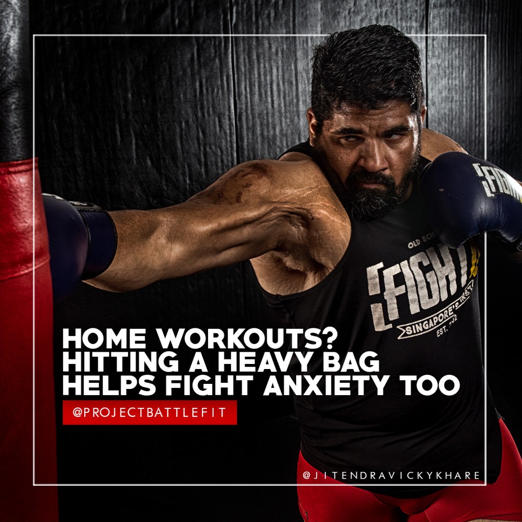 jitendra khare mma head coach tem relentless boxing muay thai on heavy bag shot by fitness photographer pushkraj shirke